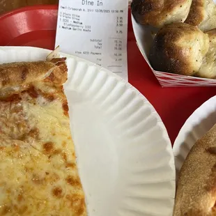 Two slices and some garlic knots.