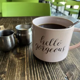 a cup of coffee on a table