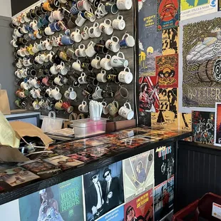 a wall of coffee cups