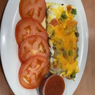 Veggie omelette with sliced tomatoes