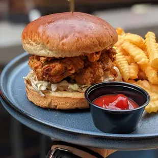 a person holding a plate of food