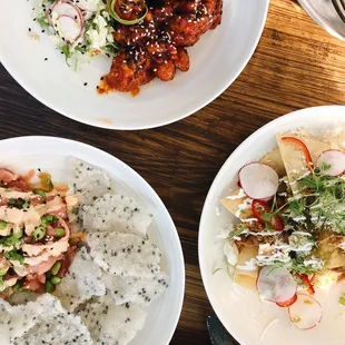 Gochujang chicken, ahi, pork al pastor nachos