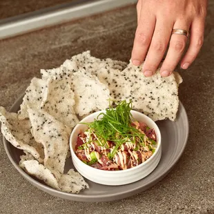 AHI TUNA, edamame, sesame, tamari, sriracha aioli, scallion, rice cracker