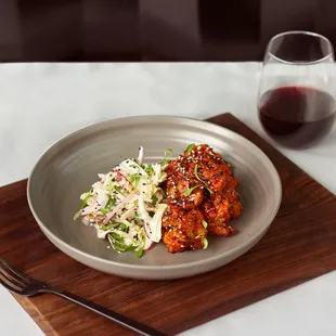 GOCHUJANG FRIED CHICKEN, radish,  napa cabbage, red onion, cilantro, aioli