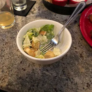 The dinner size salad arrived in a cereal bowl