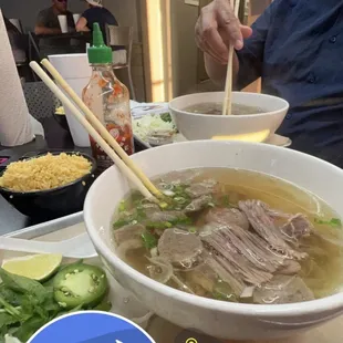 Pho with meatballs, brisket, rare beef.