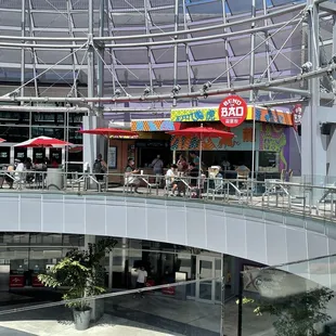 Entrance is upstairs after exiting or upon entering the parking areas