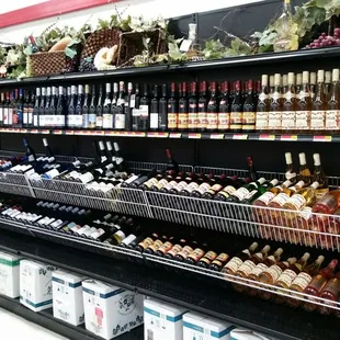 shelves of wine in a grocery store