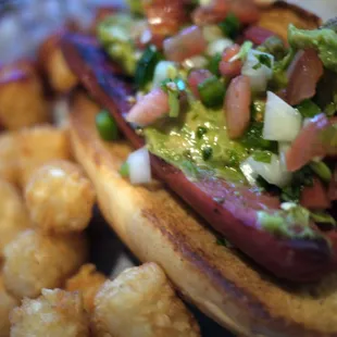 Mean green dog with tots