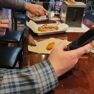 The pretzel and beer cheese and Alabama BBQ wings.
