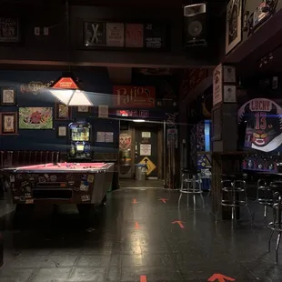 a pool table in the middle of the room