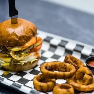 a burger and onion rings