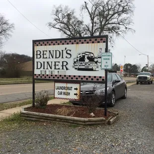 sign in front of restaurant