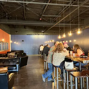 people sitting at a bar