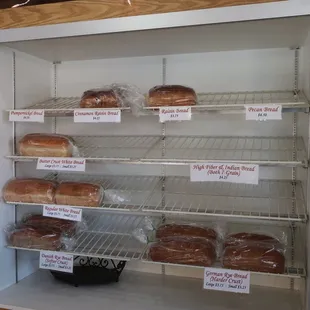 Bread loaves on display, late weekday afternoon.
