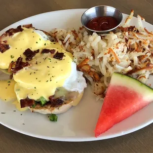 Egg Benedict with black berry