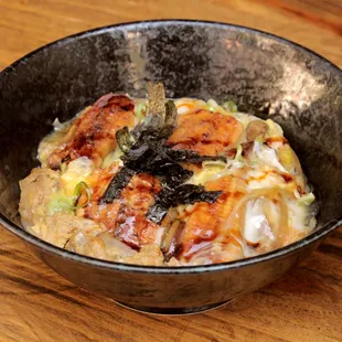 Una Tama Don - Eel simmered with soft-cooked eggs, shiitake mushrooms, onions, and scallions