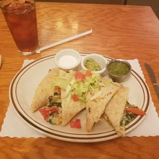 Vegetable enchilada on corn tortilla.  Wow very good and a healthy full portion/serving.   Nice hot chips &amp; salsa first.