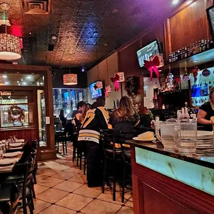 people sitting at the bar