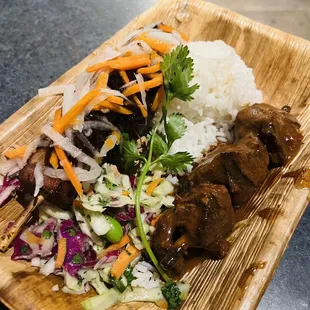 Pork Belly Skewer (left) and spicy beef skewer (right)