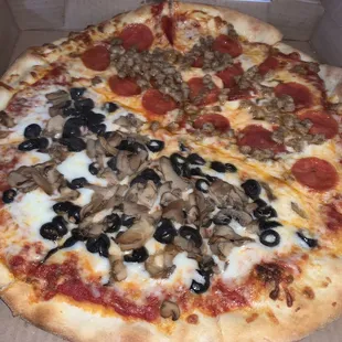 Half Olive and Mushroom, and half Pepperoni and Sausage