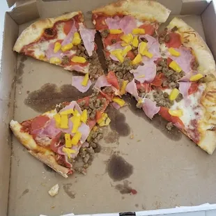 It&apos;s an awesome; Pepperoni, Ham, Sausage,and Pineapple Pizza...