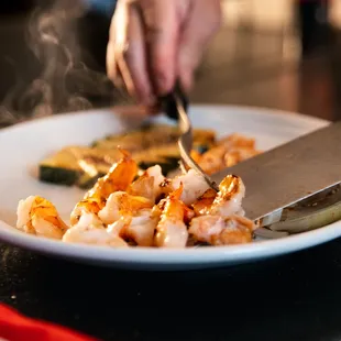 a plate of food being prepared
