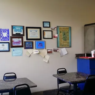 a small restaurant with tables and chairs