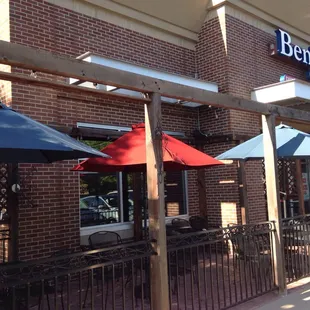 3 umbrellas hold outdoor seating