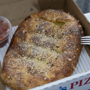 small breadsticks with marinara sauce