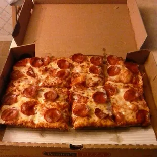 a box of pepperoni pizza