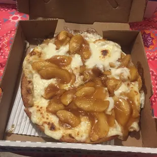 Cinnamon apple cheesecake pizza usually looks better than this, but still was tasty.