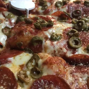pepperoni, olives, and cheese