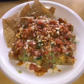 Five (5) Rolled Tacos (with Guacamole & Cheese)