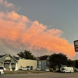 a pink cloud in the sky