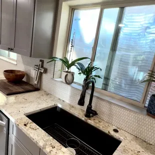 Elkay Chestnut sink with bronze delta faucet