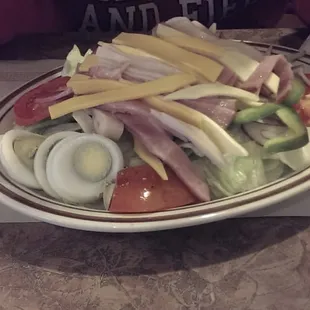 Chef salad with the long pieces of lunch meat and sandwich cheeses.