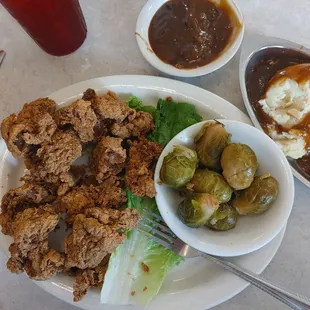 Chicken Livers, Brussel Sprouts, gravy and mashed potatoes