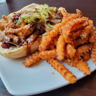 Brisket sandwich with sweet potato fries