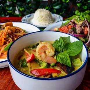 Family style Thai dinner (Green curry,Pad Thai, Yum beef)