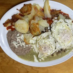 Enchiladas montadas with red and green sauce with eggs on top...