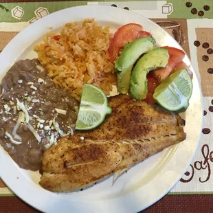 Grilled snapper special with rice, beans, and homemade corn tortillas. So good!