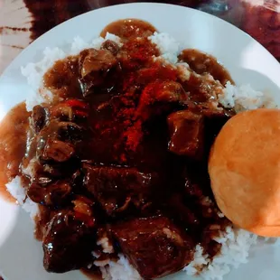 kembel or strips of lamb over rice with biscuit