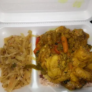 Curry chicken with rice and cabbage.