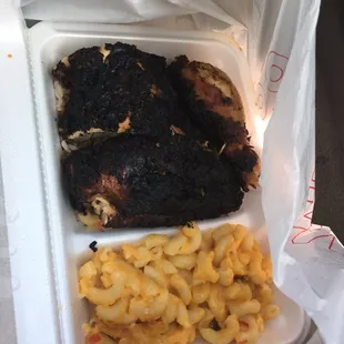 Jerk chicken, rice and peas, mac and cheese. It was just OK.