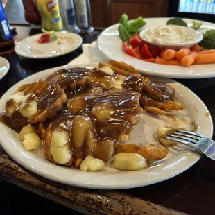 My favorite, waffle fries with brown gravy and cheese curds. Their version of poutine. Veggie platter with house made ranch.