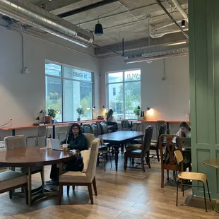 To the left of entrance