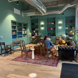 To the right of entrance