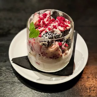 Fresh Berries with créme anglaise and topped with Chantilly cream