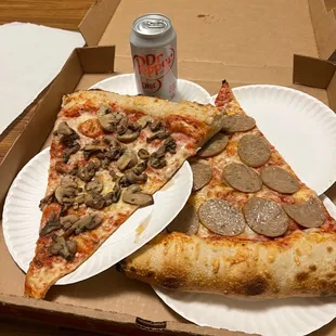 Slice of mushroom and garlic and a slice of sausage.